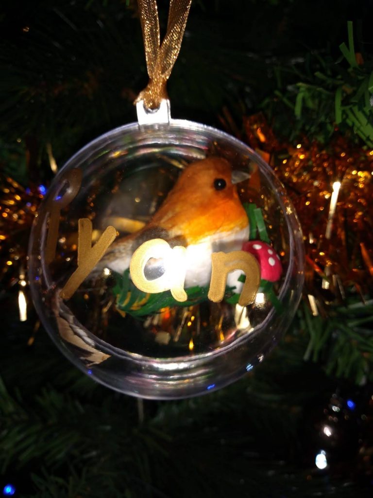 Personalised Christmas bauble with Ryan's name on it